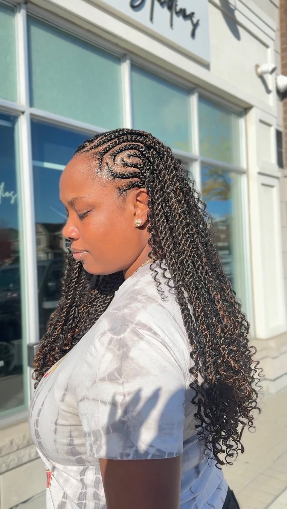 A BGR Hair Studios stylist working with a client in the salon